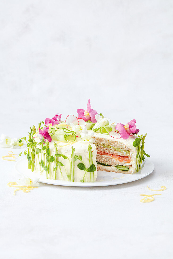Sandwich cake with salmon, avocado and cream cheese