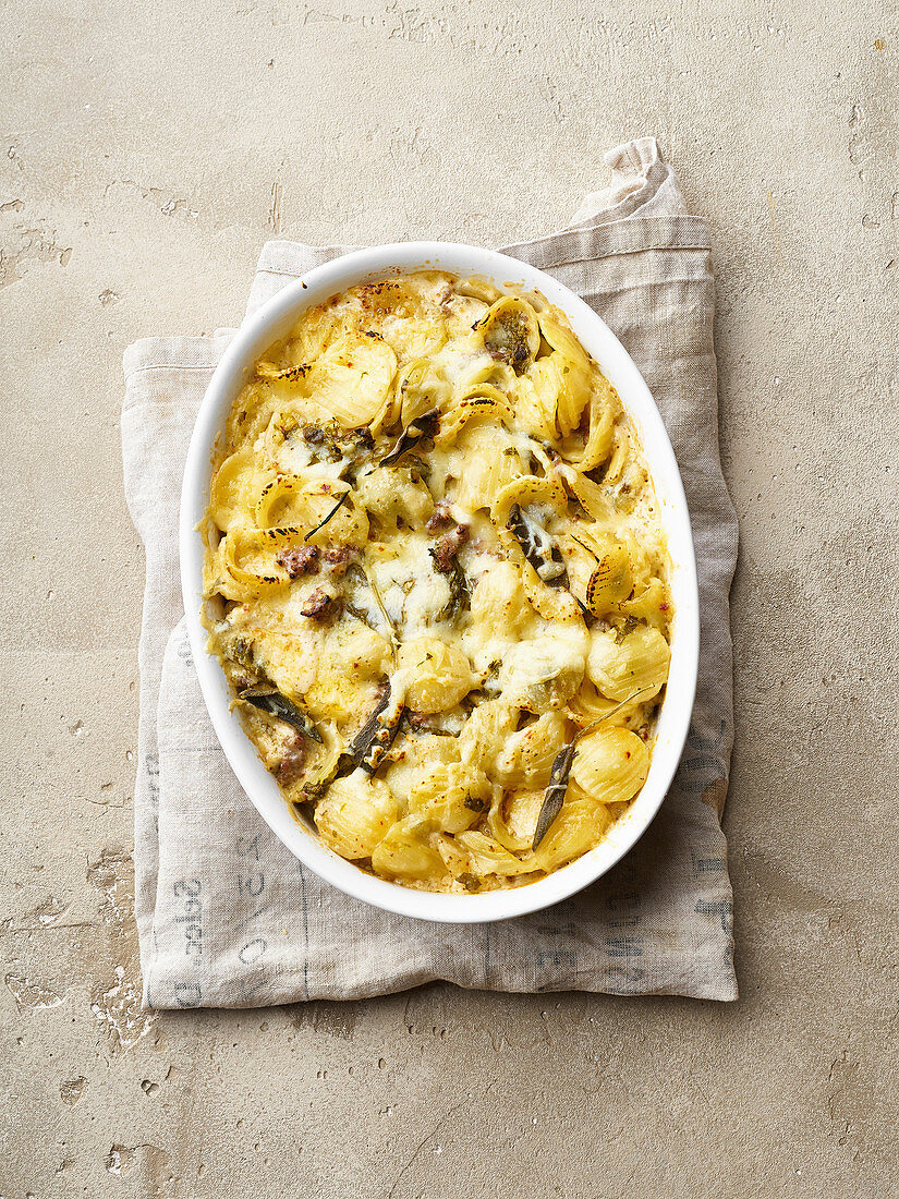 Pasta bake with sausage, sage, cheddar and cream