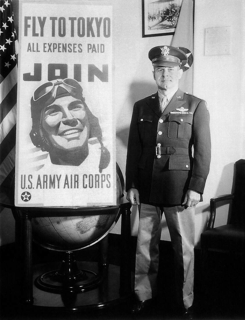 Brigadier General James H. Doolittle with recruiting poster