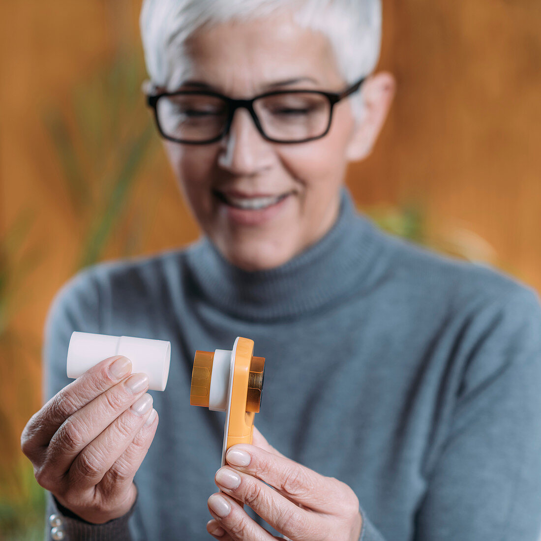 Woman measuring lung capacity and peak expiratory force