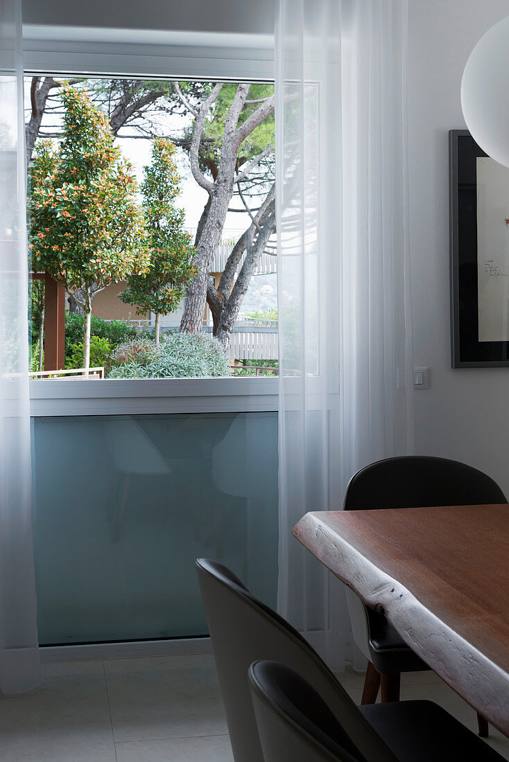 Dining room window with view of garden