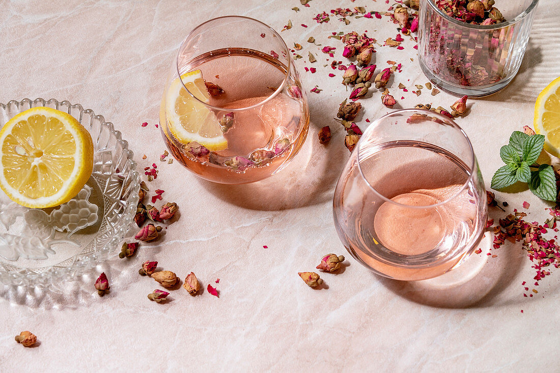 Pink champagne cocktails with dried rose petals