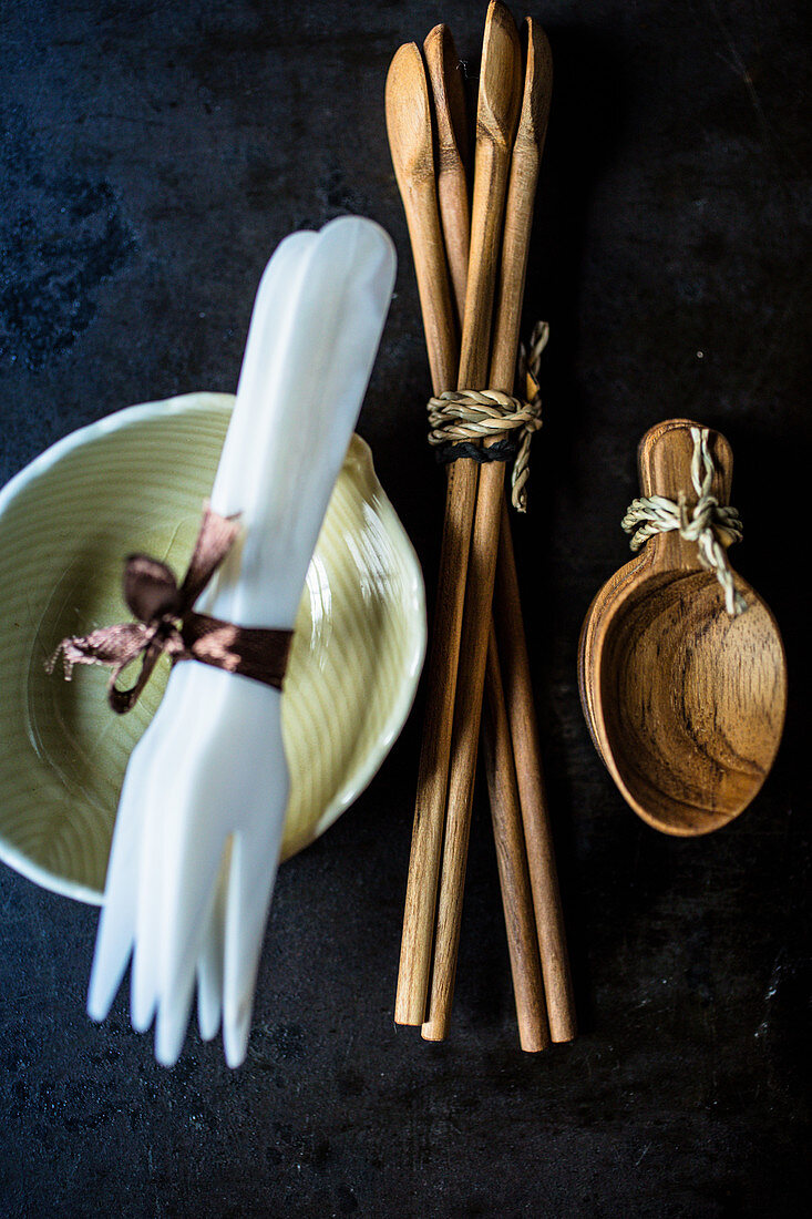 Ceramic soup, forks and wooden spoons