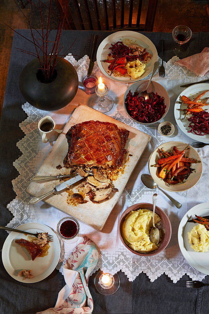 Slow-roast pork shoulder with mustard mash and honey-roasted carrots