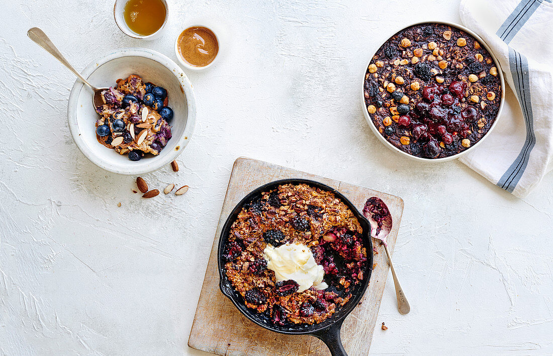 Three ways with baked oats - blueberry and nut oat bake, cocoa and cherry oat cake, blackberry and apple oat cake
