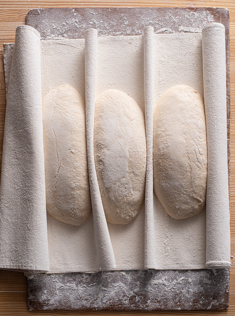 Pre-shaped bread dough in Couche