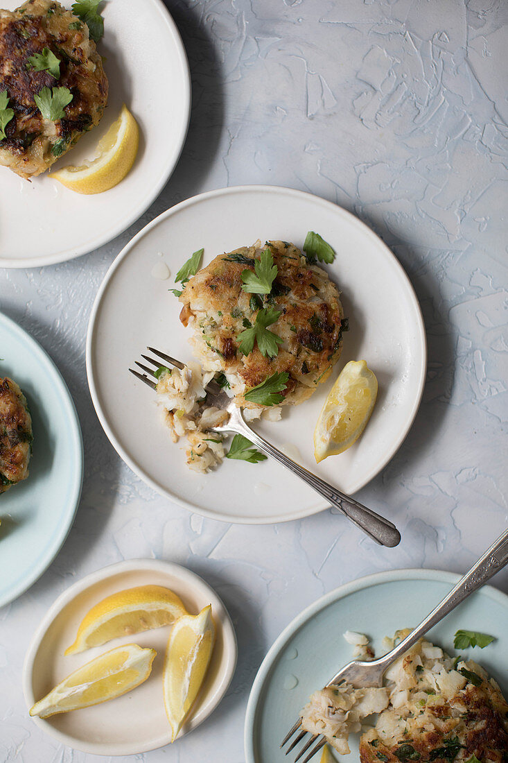 Fish cakes with lemon and parsley.