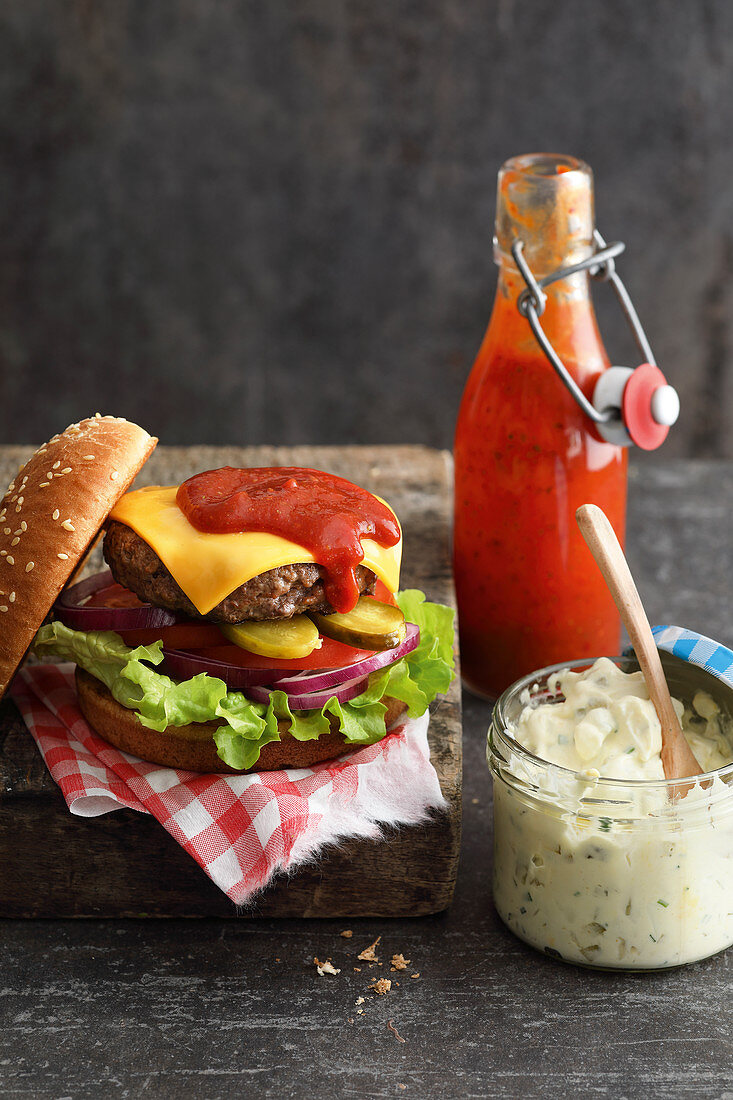 A cheeseburger with a homemade sauce and eggless remoulade