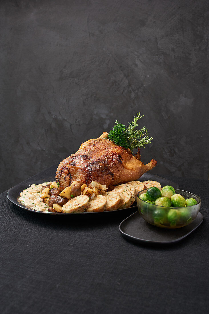 Duck with chestnut and apple stuffing and napkin dumplings