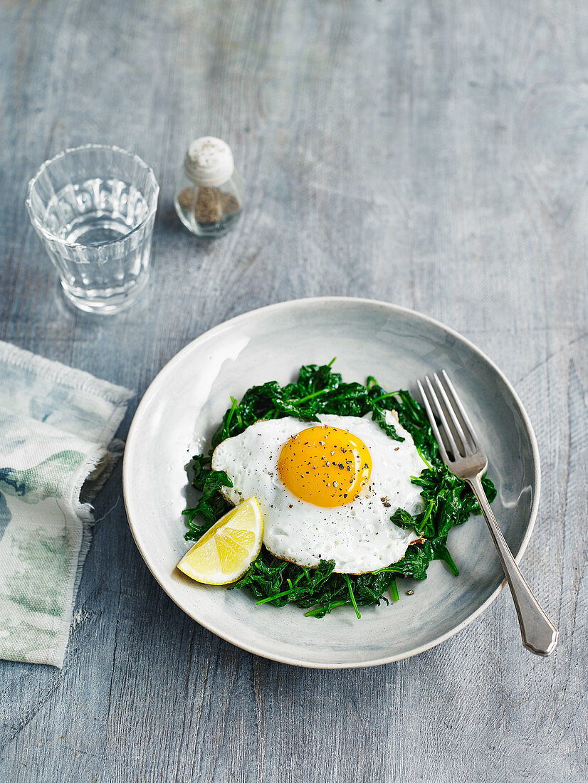 Fried egg with greens