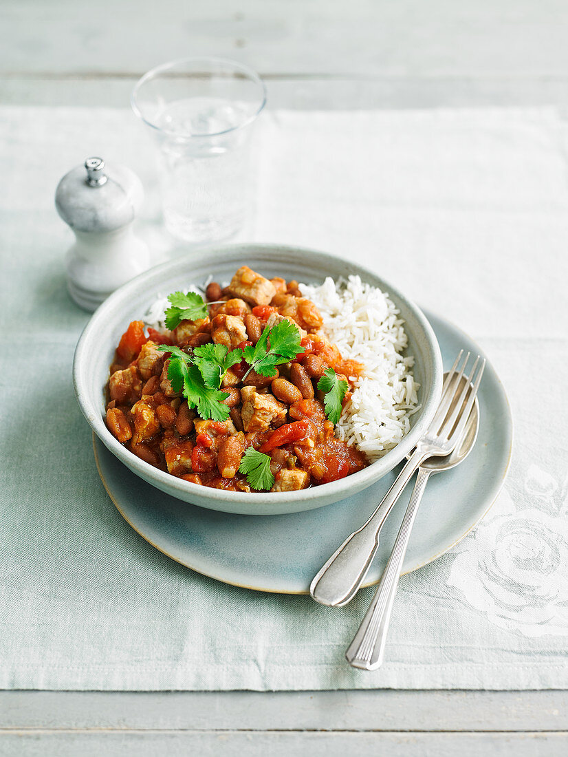 Pork stew with tomatoes and beans