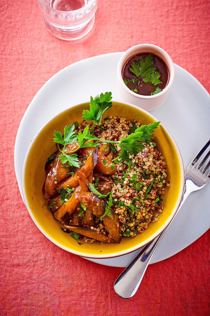 Aubergine quinoa with parsley and spicy sauce