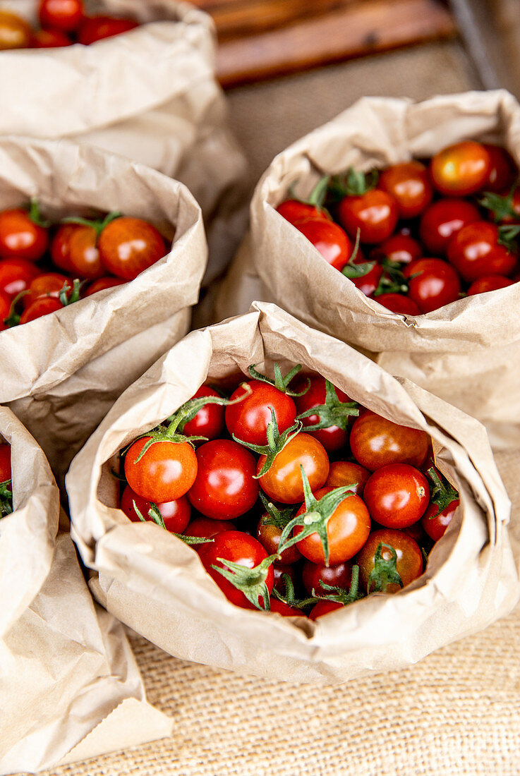 Cherry tomatoes in paper bags