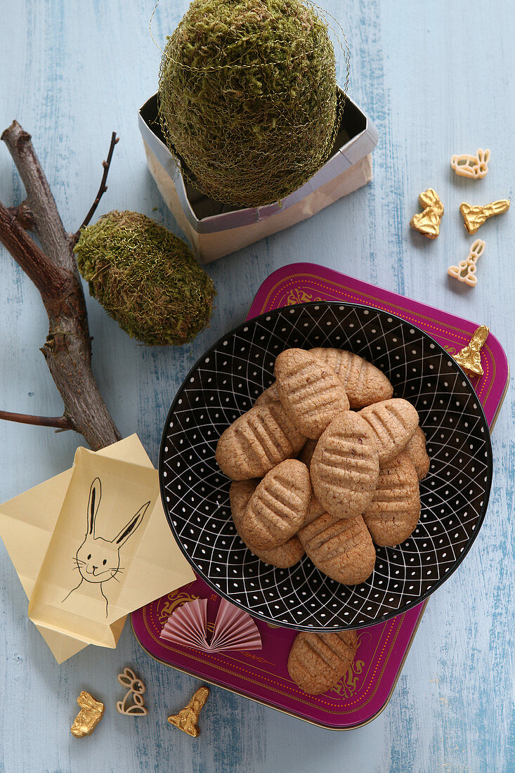 Gluten-free egg-shaped biscuits and Easter decorations