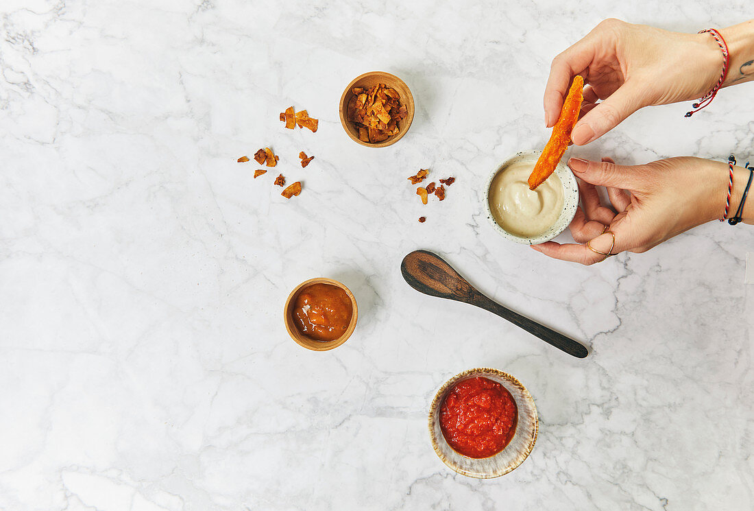 Various vegan dips with sweet potato chips