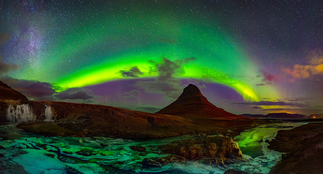 Aurora borealis over Kirkjufellsfoss waterfall, Iceland