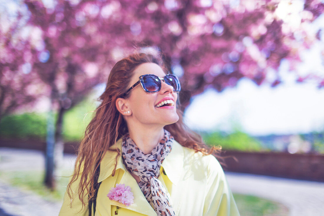 Young woman walking in park