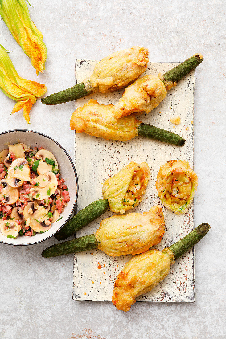 Stuffed courgette flowers with Alpine cheese, mushrooms and bacon