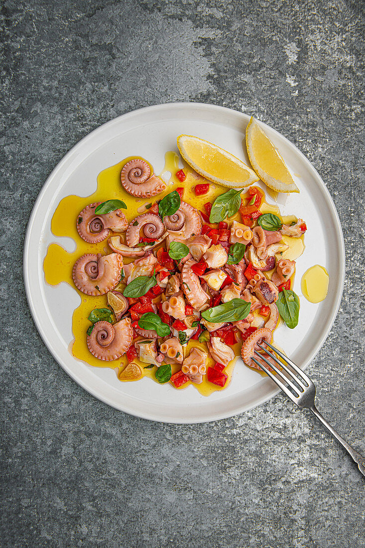Marinated octopus in olive oil, red pepper, lemon and garlic