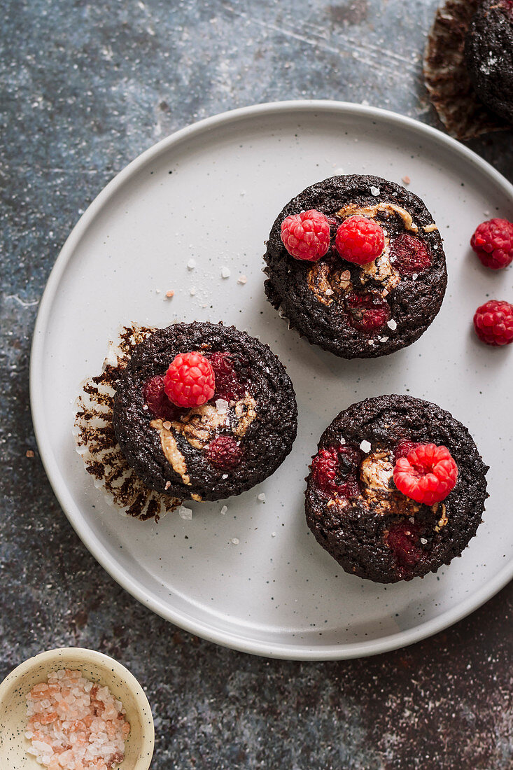 Chocolate muffins with raspberries