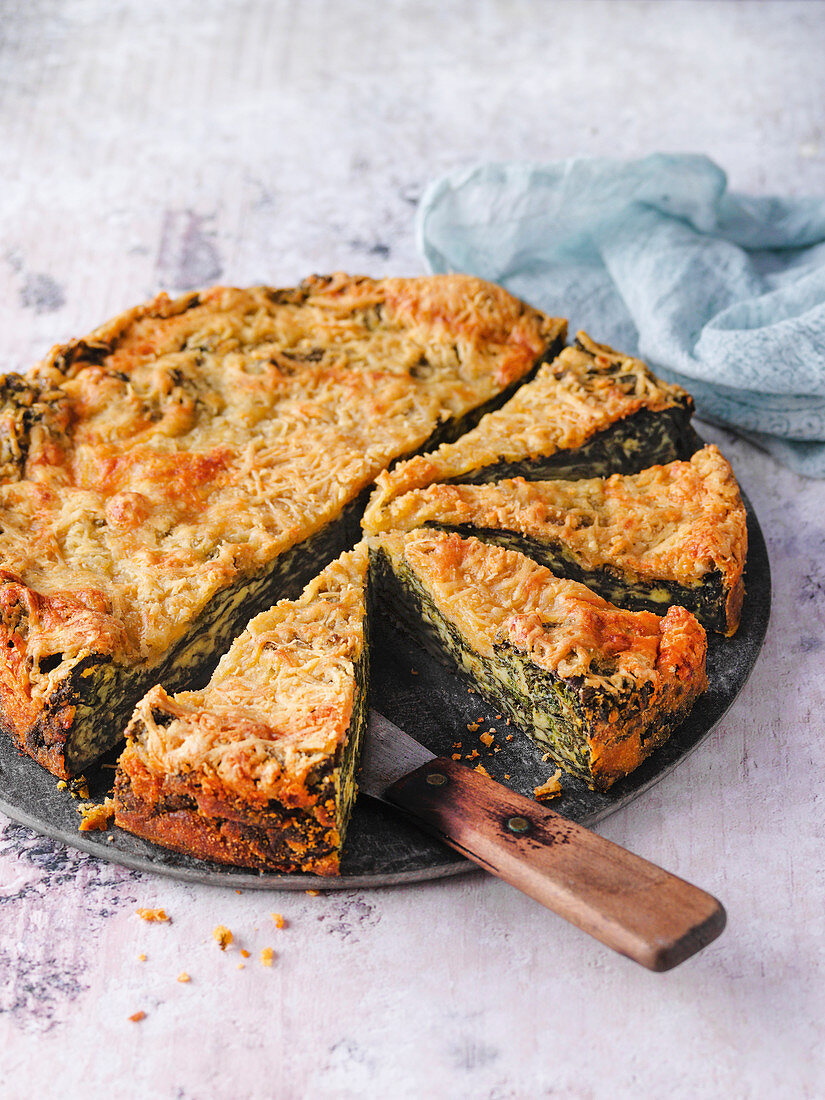 Spinach cake with a cheese crust