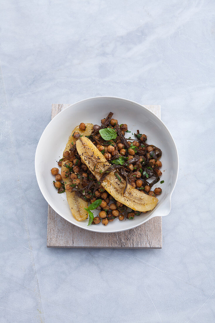 A candied banana with spicy chickpeas and kombu royale