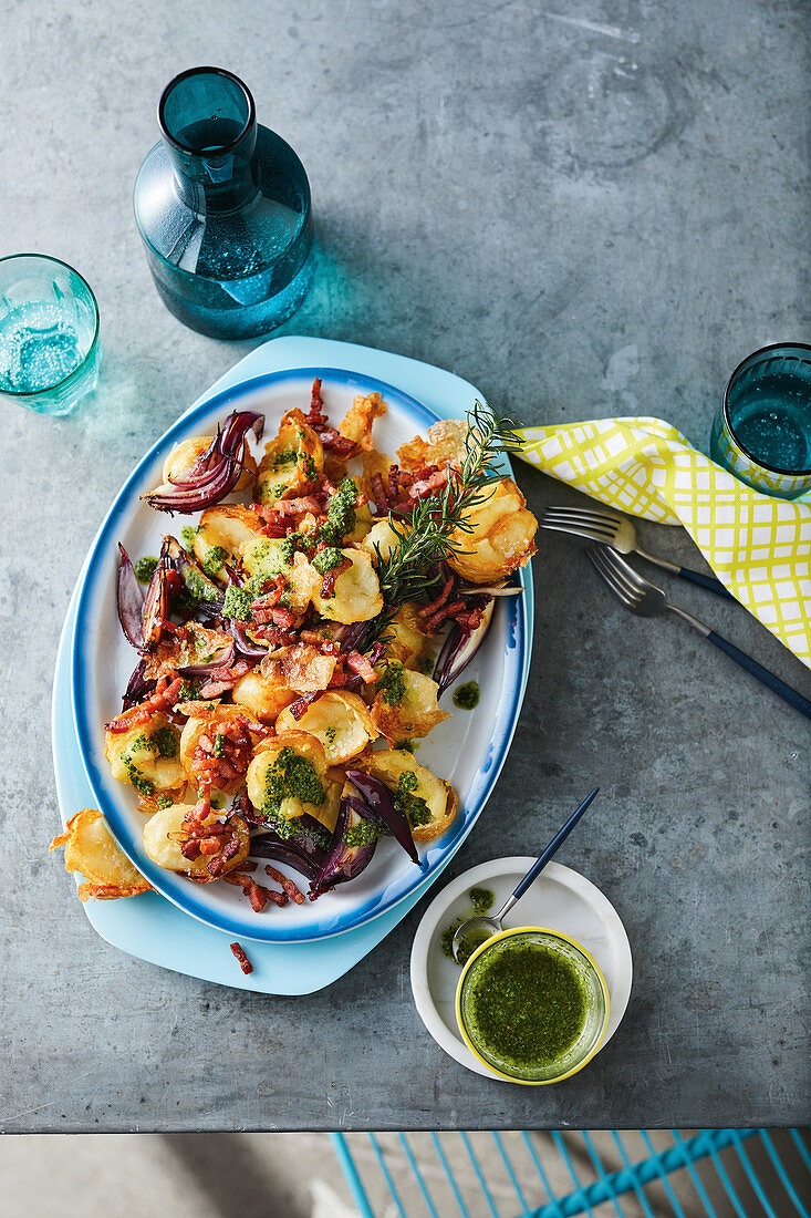 Crispy potatoes with salsa verde and fried rosemary