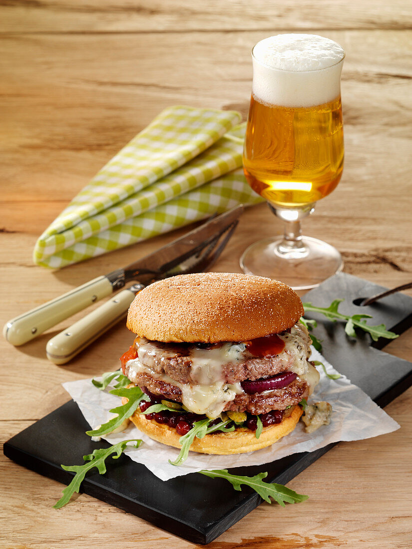 A beef burger with bourbon onions and Gorgonzola
