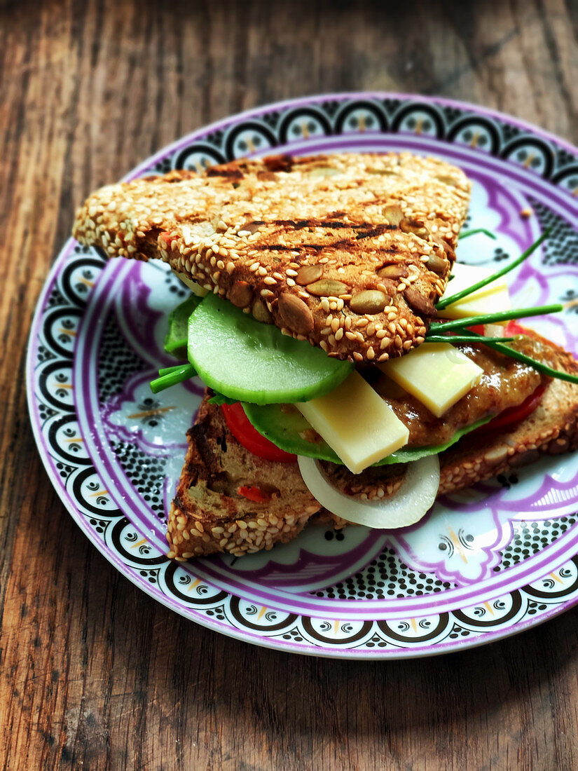 Wholemeal sandwich with avocado, cheese and cucumber