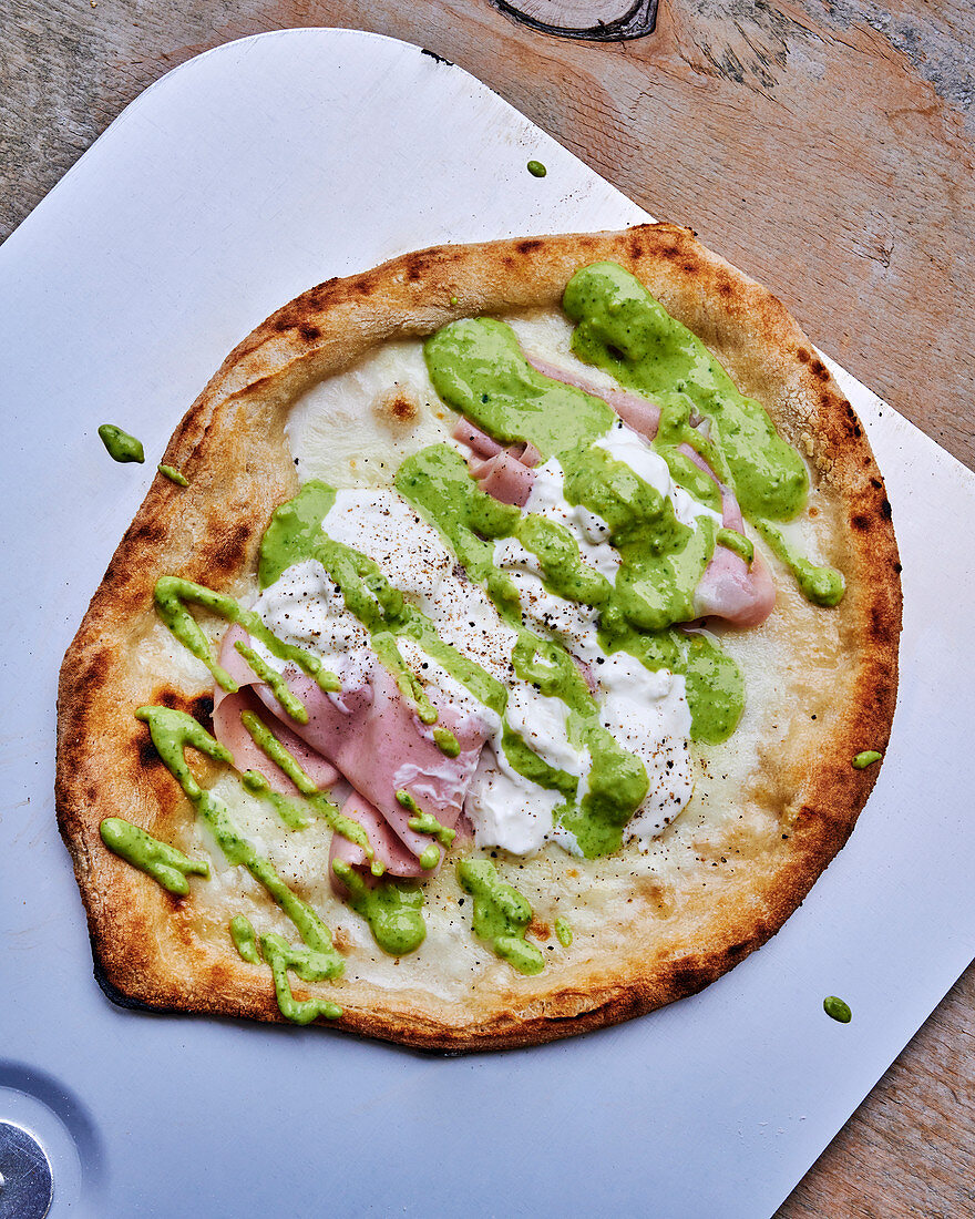 Pizza with mortadella and pistachio cream
