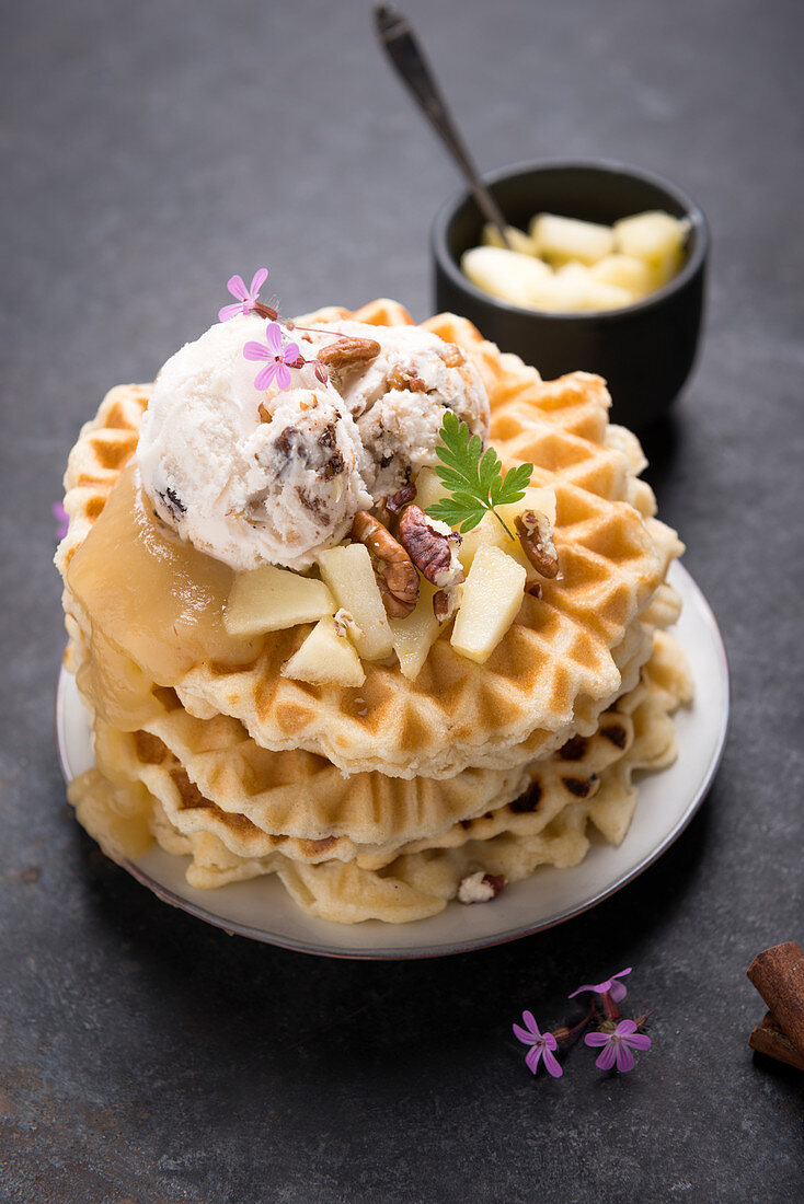 Waffles with vanilla and pecan nut ice cream, apple sauce and apple compote