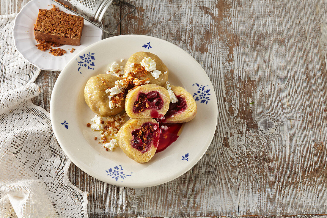 Barley dumpling with cherries, gingerbread and cottage cheese