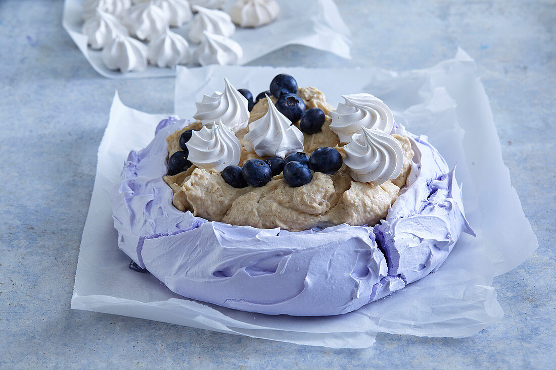 Blueberry pavlova with banana ice cream