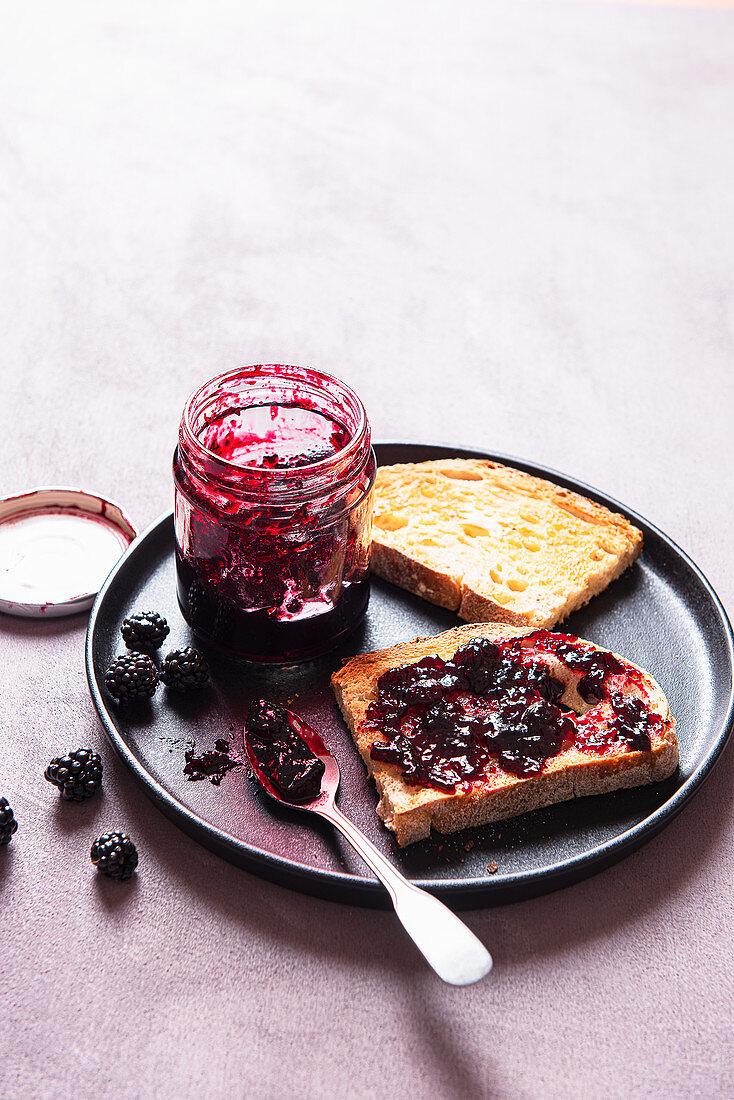 Homemade blackberry jelly on a sourdough bread