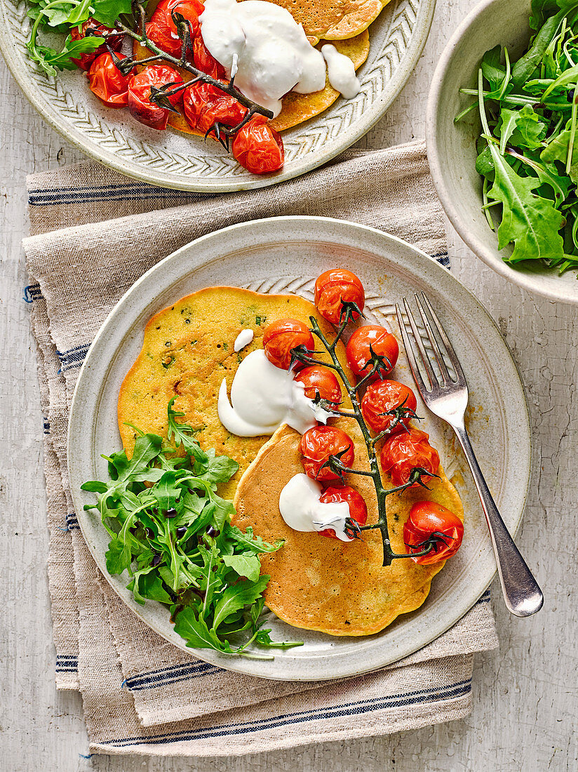Chickpea pancakes with whipped feta and roasted tomatoes