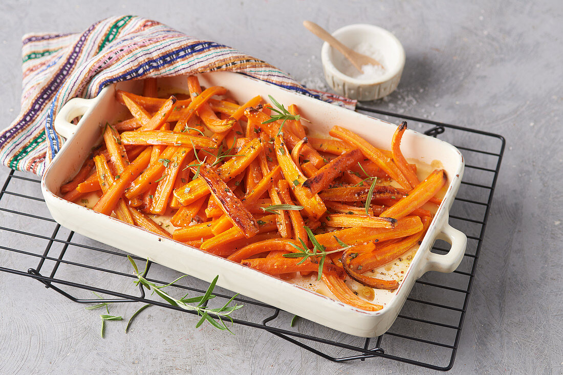 Fried carrot sticks with rosemary