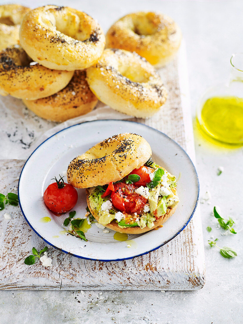 Poppy seed bagels with avocado salad