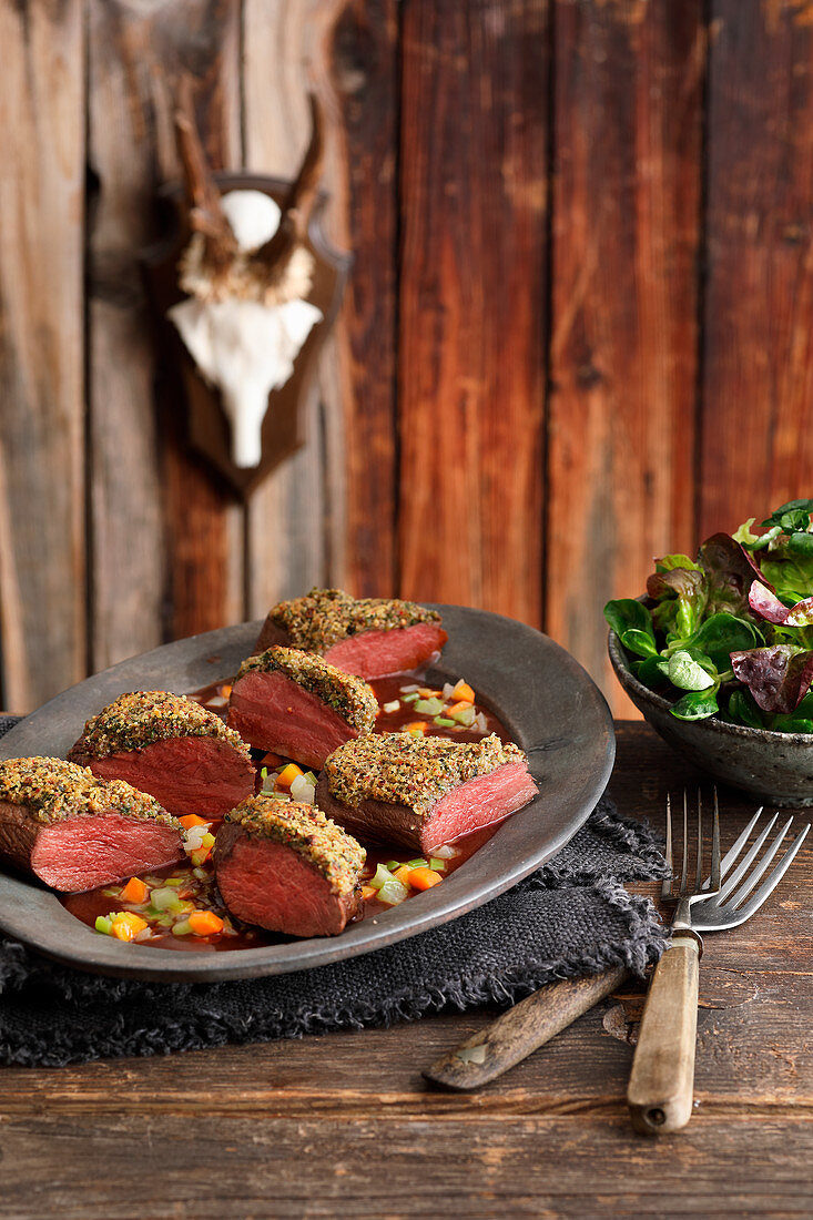 Saddle of venison with a pepper crust