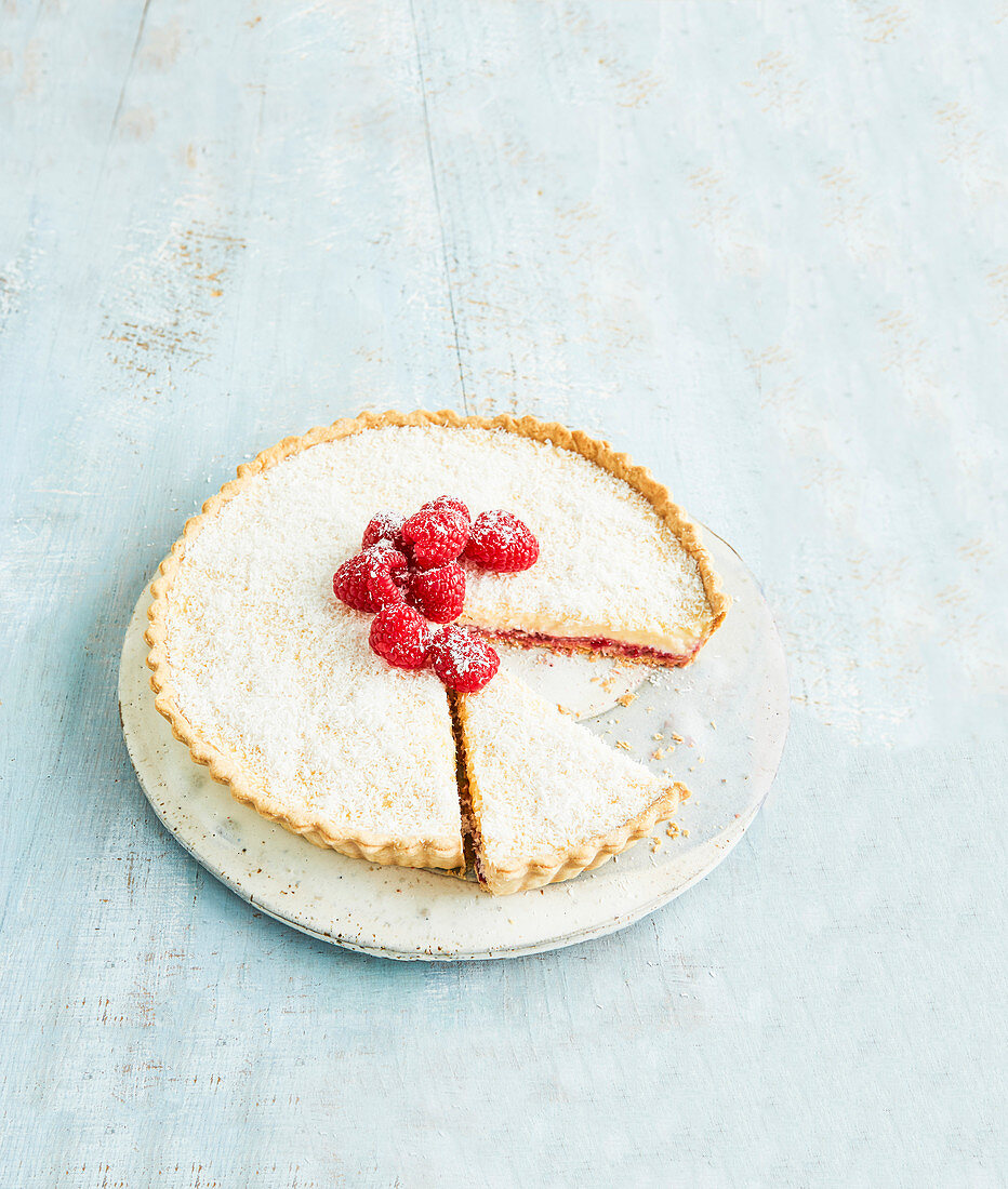 Cheat’s Manchester tart with coconut and raspberries