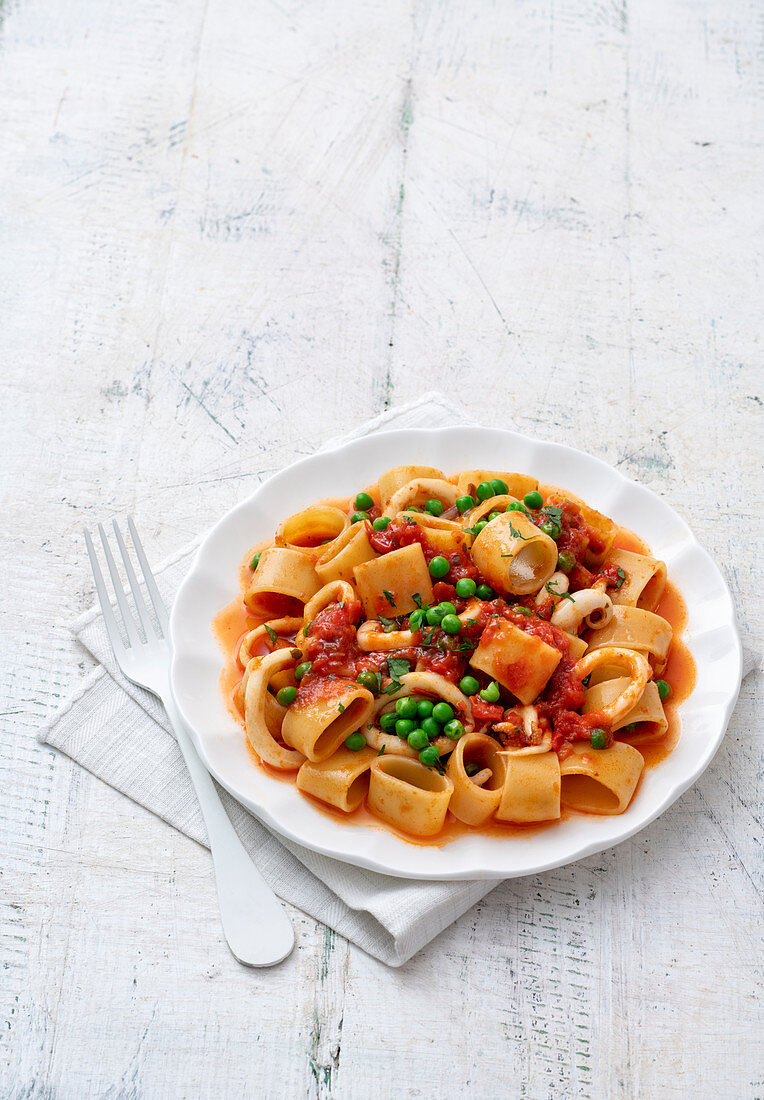 Calamarata pasta with squid and peas – License image – 13269507 Image ...
