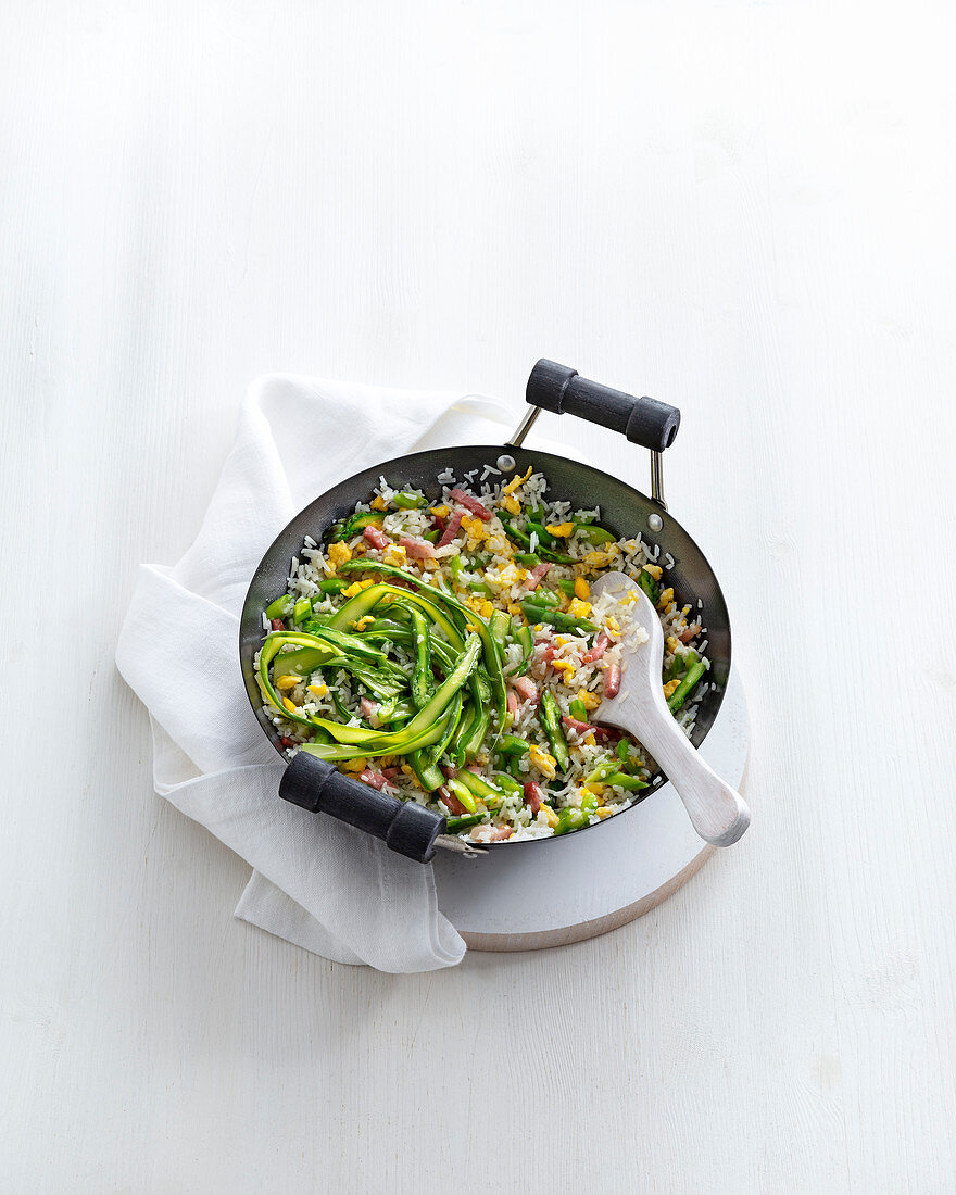 Fried rice with green asparagus and egg