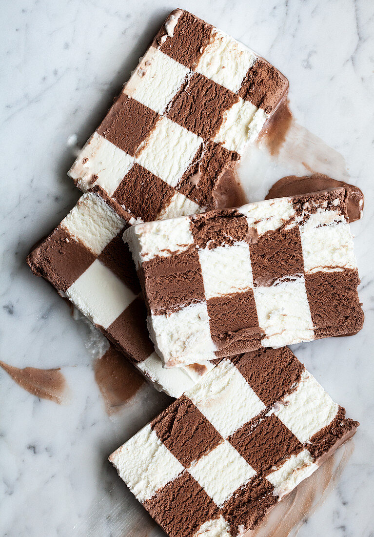 Slices of vanilla and chocolate checkerboard ice cream