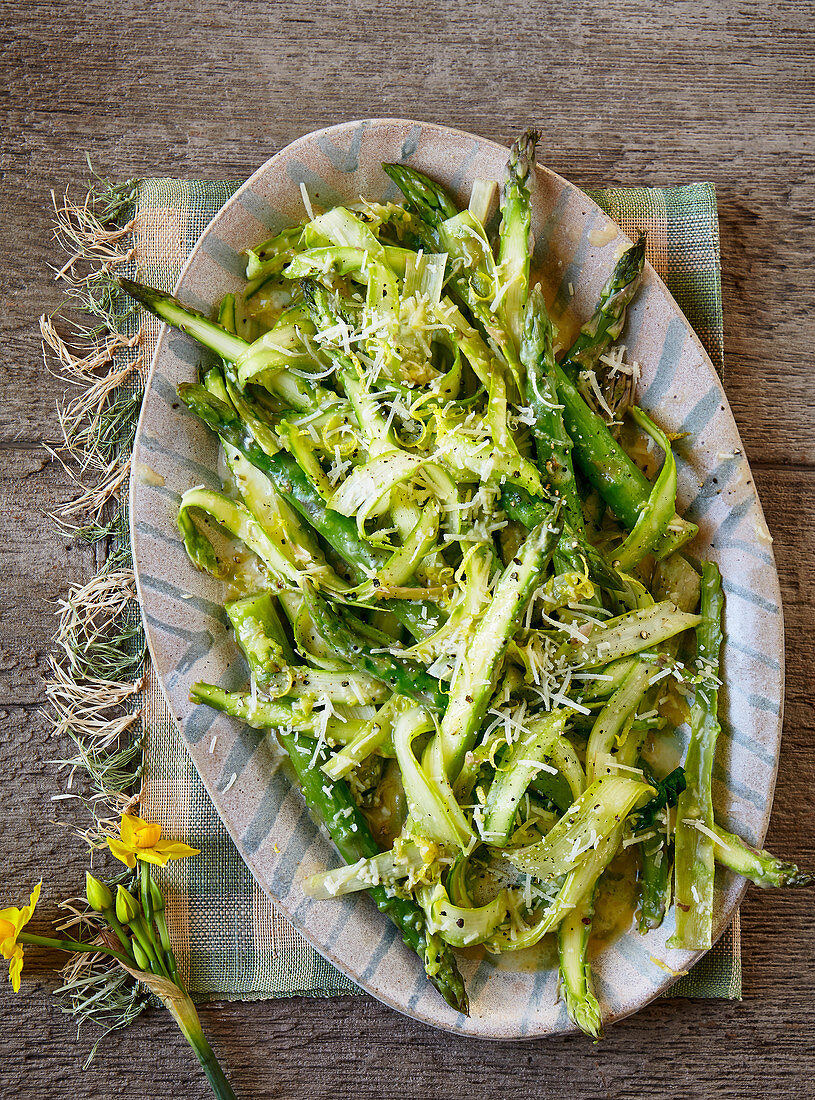 Raw and cooked asparagus with lemon and parmesan butter
