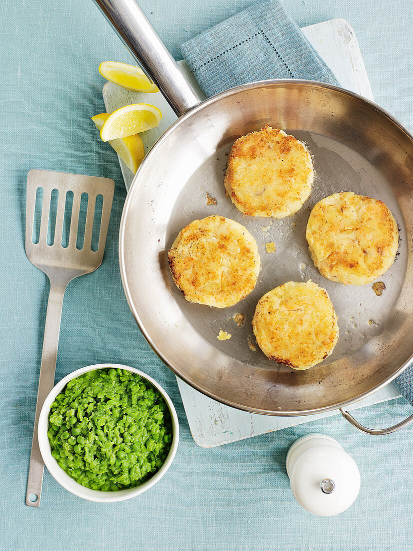 Fish cakes with mushy peas