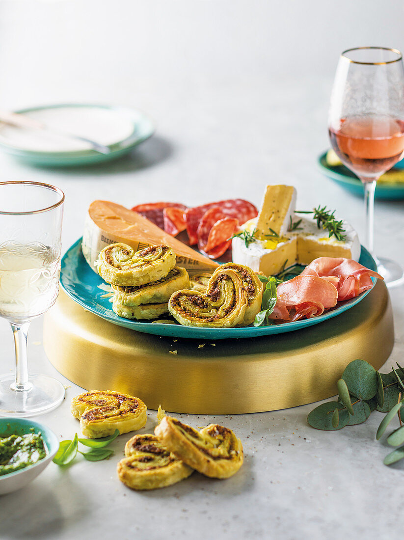 Basil pesto palmiers and cheese platter