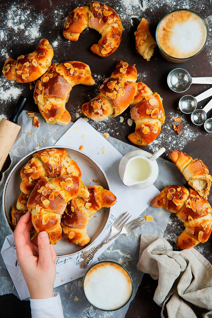 Croissants with white poppy seeds and almonds