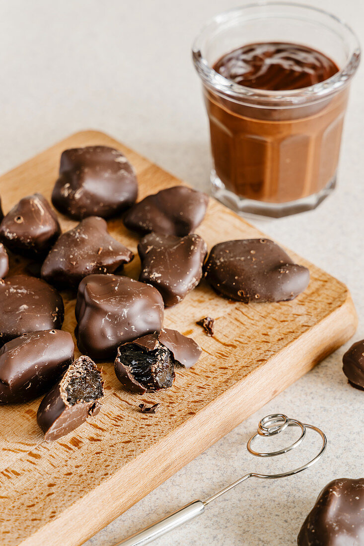 Handmade dried plums in dark chocolate