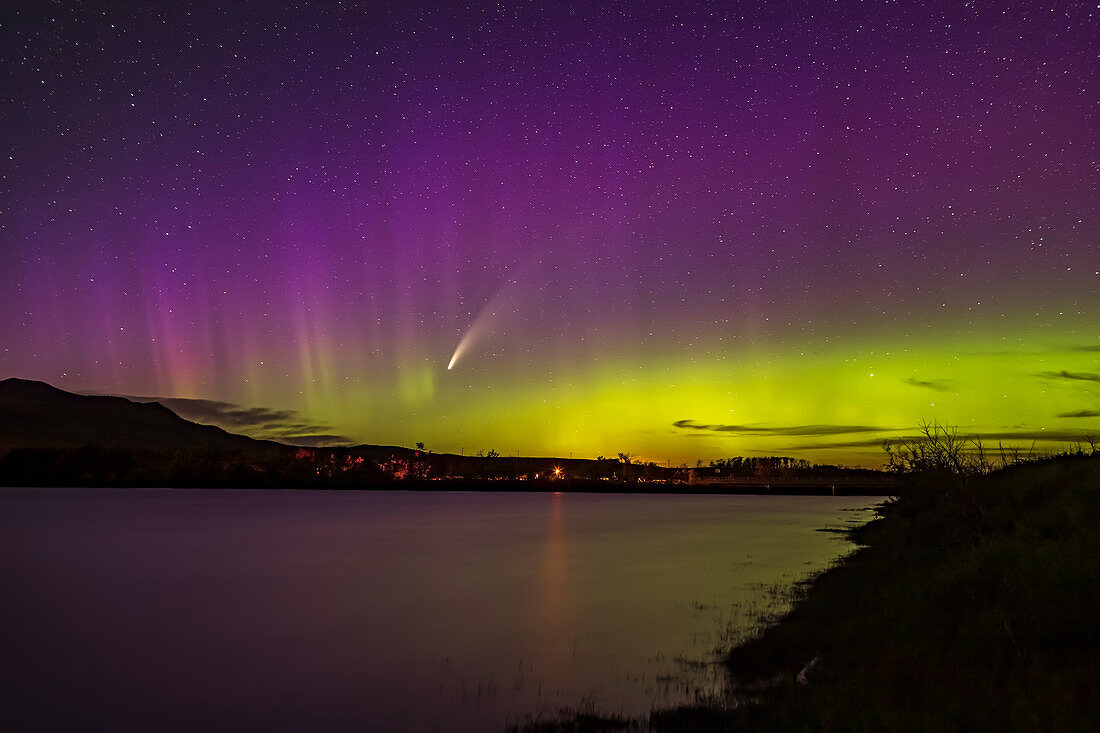 Comet NEOWISE and aurora, Waterton River, Alberta, Canada