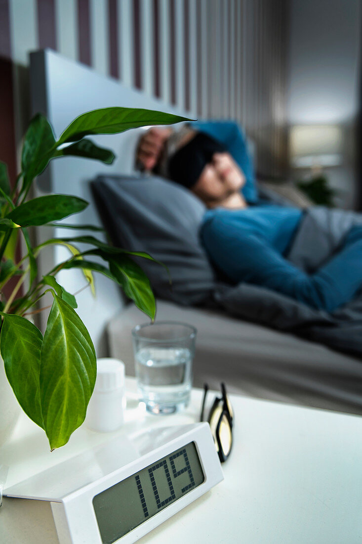 Mature woman wearing black sleep mask