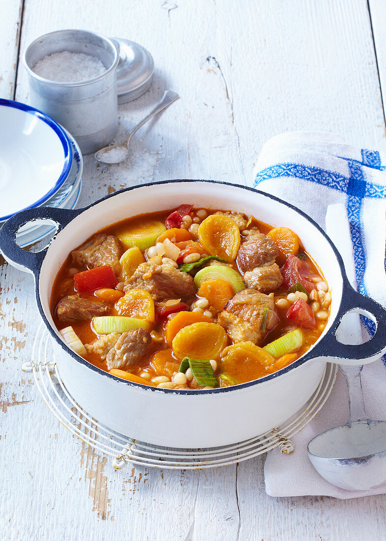 Pork stew with beans and apricots
